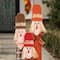 Glitzhome® 36.25" Wooden Scarecrow Family Porch Décor with Lighted Wreath & Timer